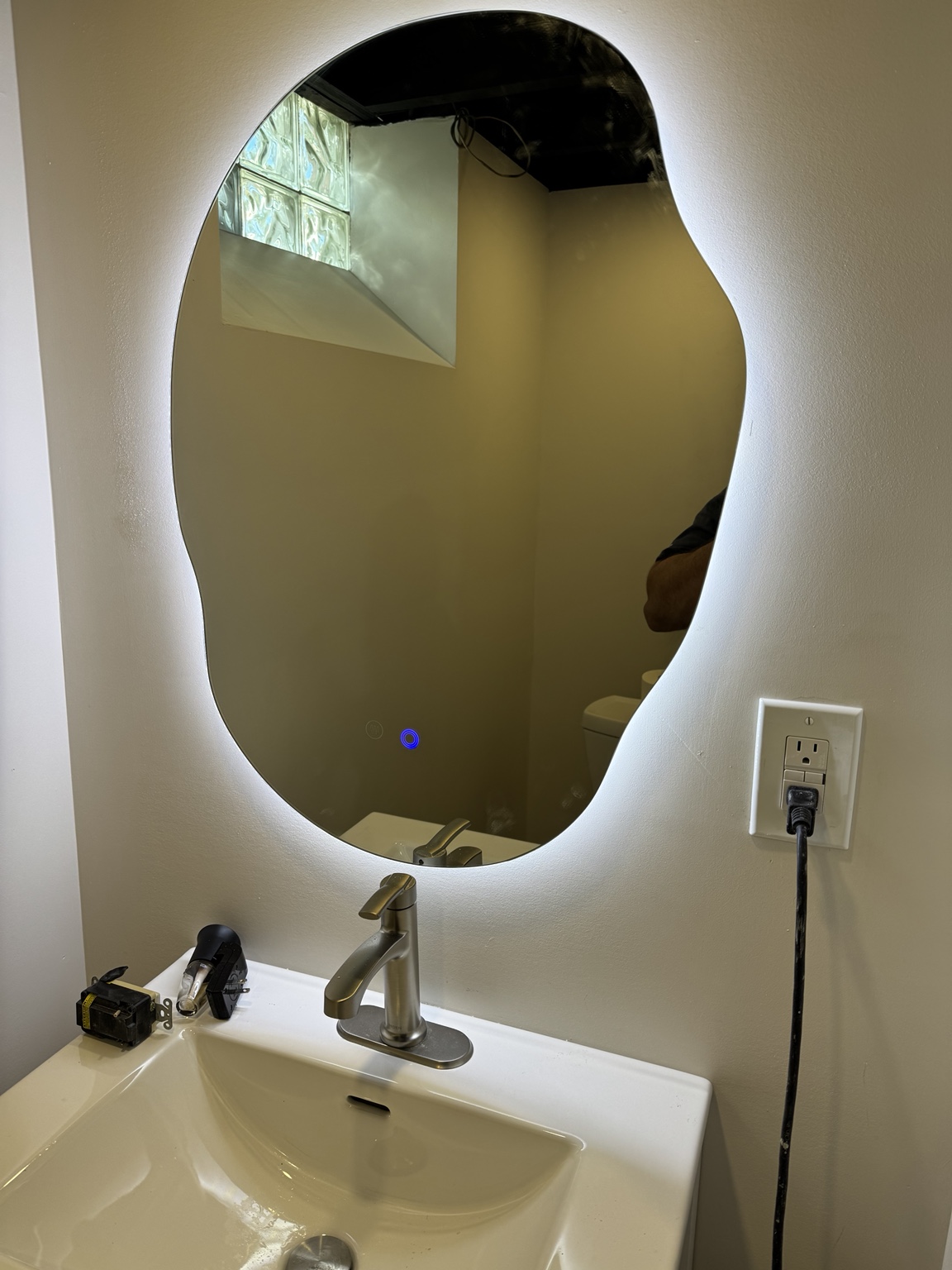 Backlit bathroom mirror