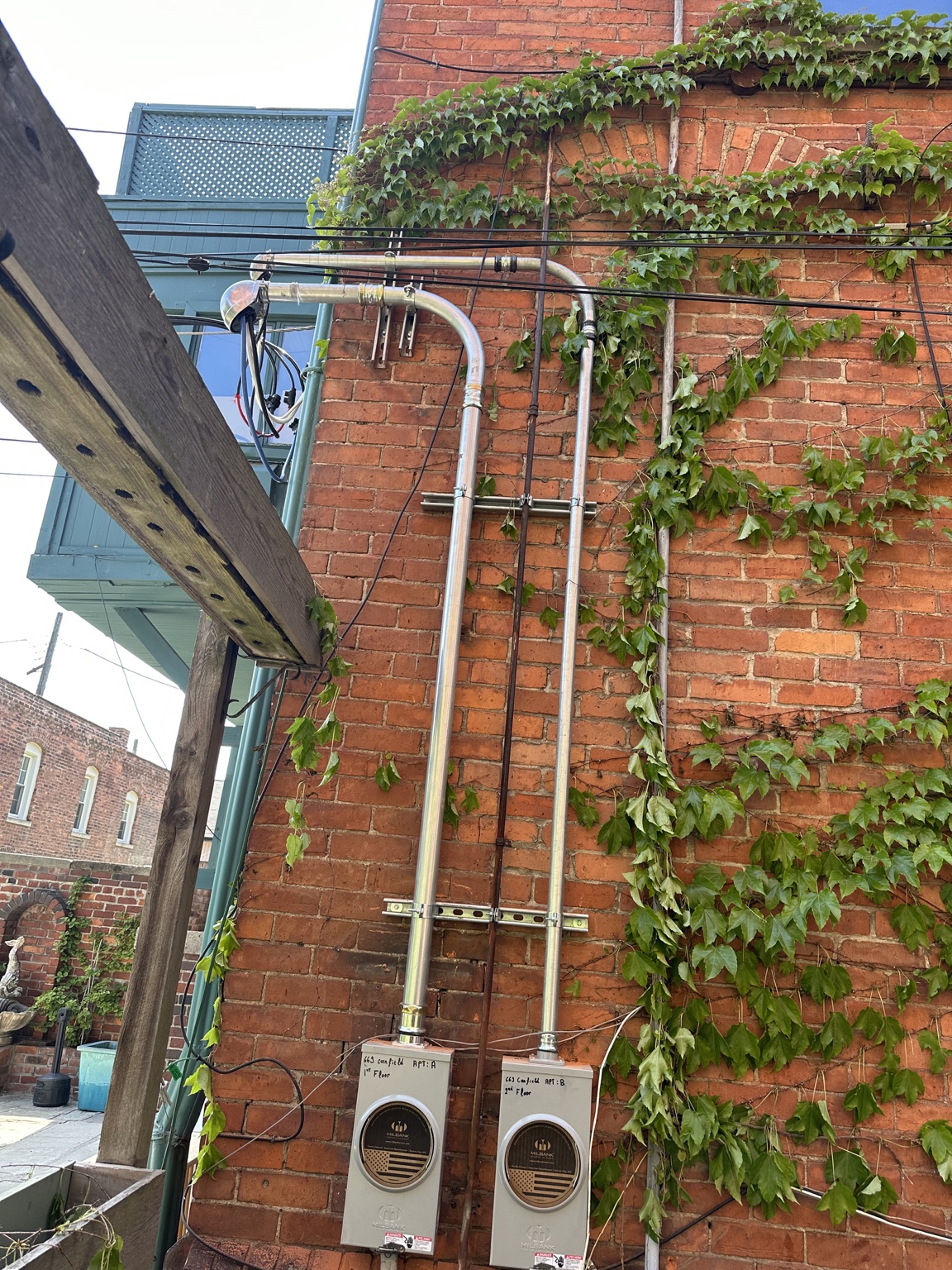 Dual electrical meter and service installation
